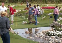 People playing Adventure Golf