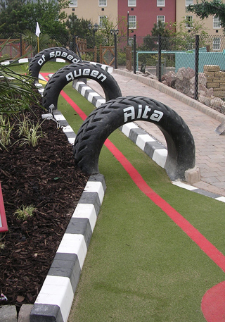 Tires over adventure golf fairway