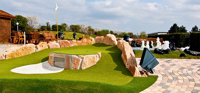 Adventure golf hole called tunnel under green